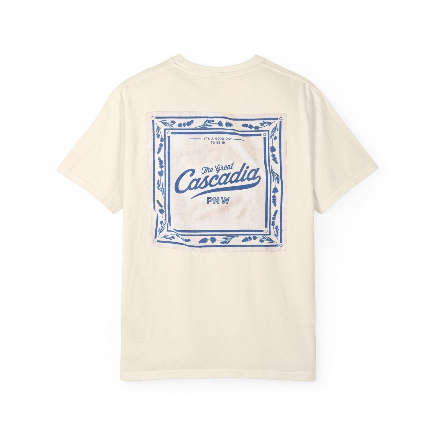 Seastack cream 100% cotton short sleeve tee with a blue graphic on the back featuring "The Great Cascadia PNW" text.